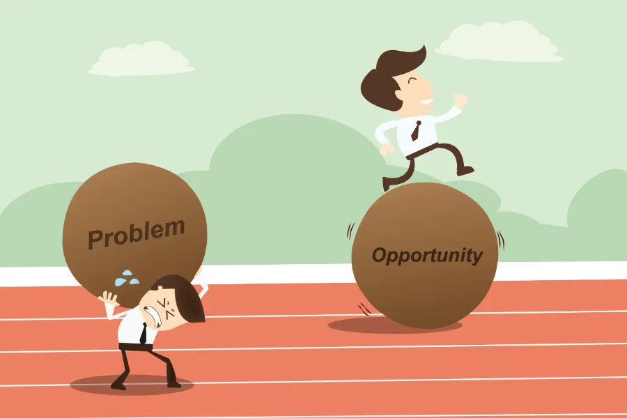 Illustration of a businessman pushing a boulder labeled Problem while another stands on one labeled Opportunity